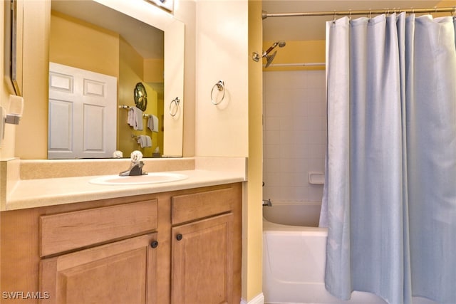 bathroom with vanity and shower / tub combo