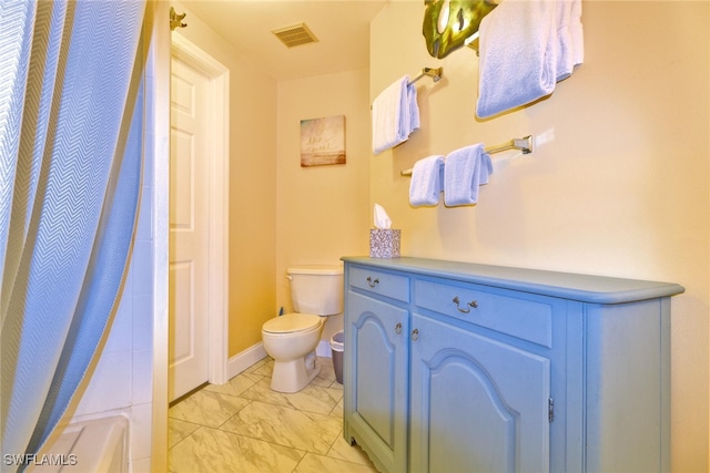 full bathroom featuring vanity, toilet, and plus walk in shower