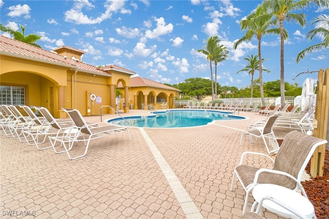 view of pool featuring a patio