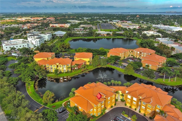 bird's eye view with a water view