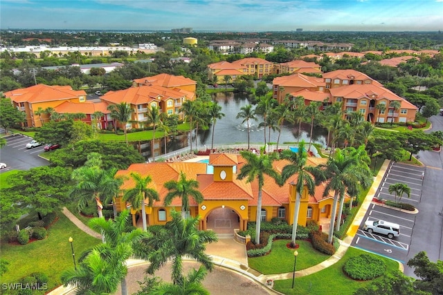 drone / aerial view featuring a water view