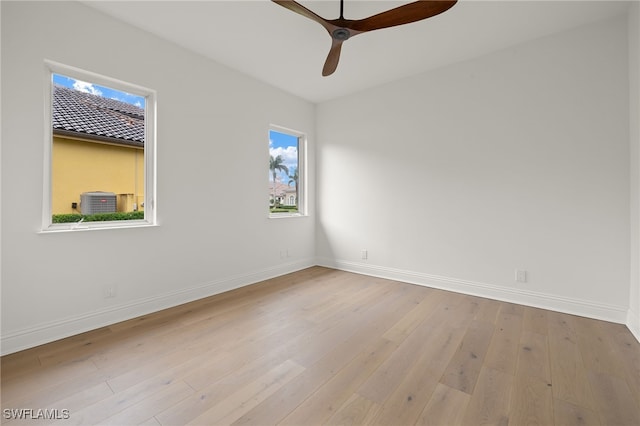 spare room featuring ceiling fan and light hardwood / wood-style floors