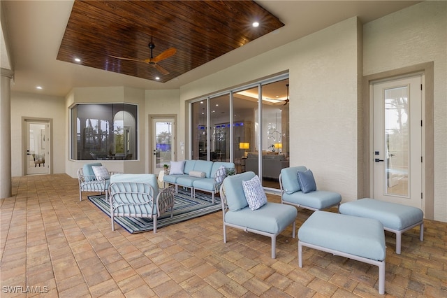 view of patio featuring an outdoor living space and ceiling fan