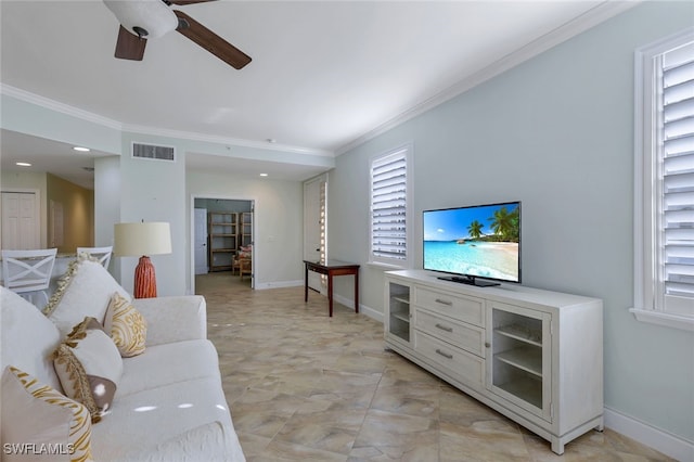 living room featuring ornamental molding and ceiling fan