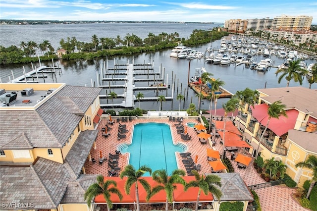 birds eye view of property featuring a water view