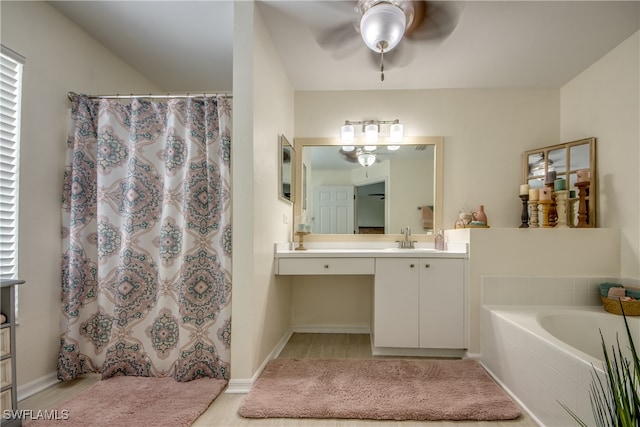 bathroom with independent shower and bath, vanity, and ceiling fan