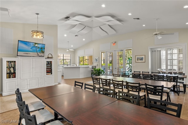 dining room with french doors, ceiling fan, and high vaulted ceiling