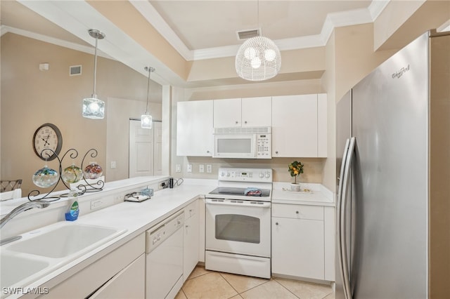 kitchen featuring white cabinetry, white appliances, light tile patterned floors, crown molding, and sink