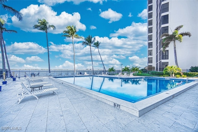 view of swimming pool featuring a patio