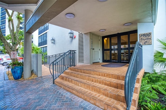 entrance to property featuring french doors