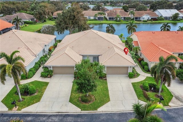 aerial view featuring a water view