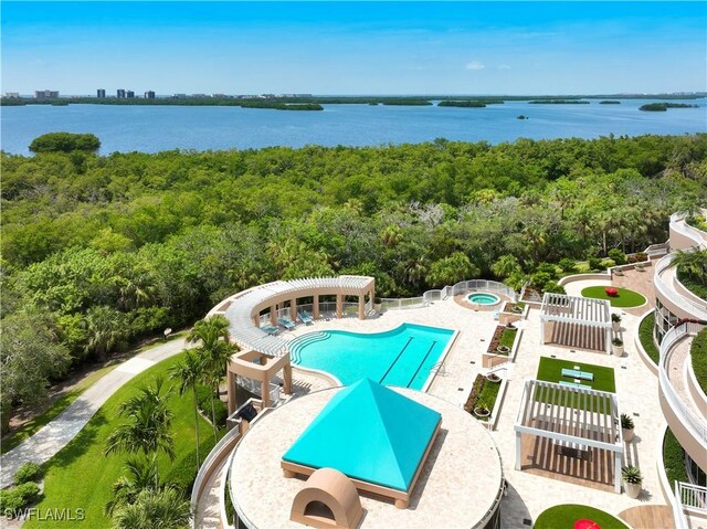 pool featuring a water view, a pergola, and a patio area