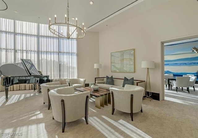 carpeted living room with a high ceiling