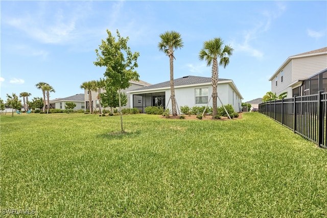 view of yard featuring fence