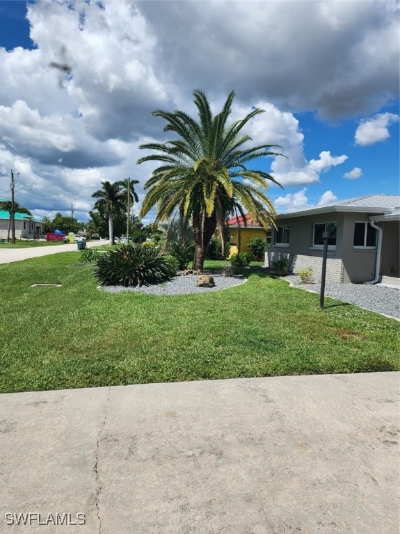 exterior space with a front yard