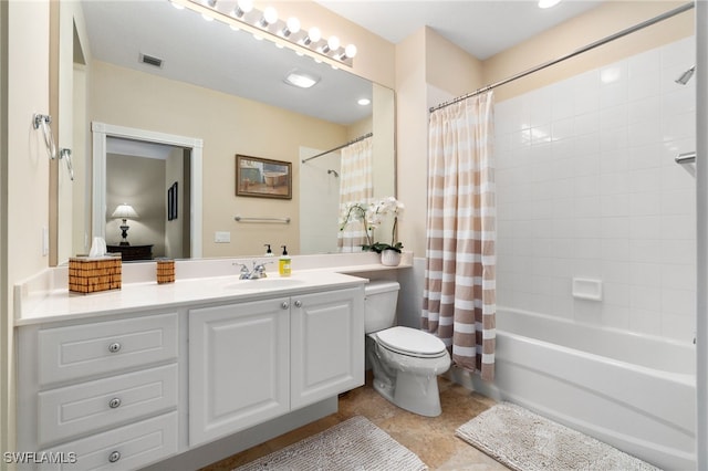 full bathroom with shower / bath combination with curtain, vanity, and toilet