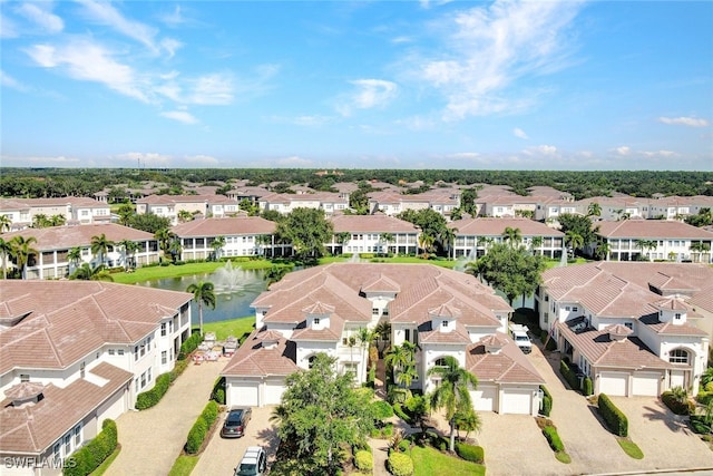 571 Avellino Isles Cir Unit 27102, Naples, FL 34119 - aerial perspective of suburban area with a large body of water