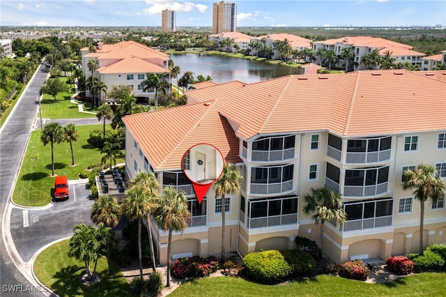 aerial view featuring a water view