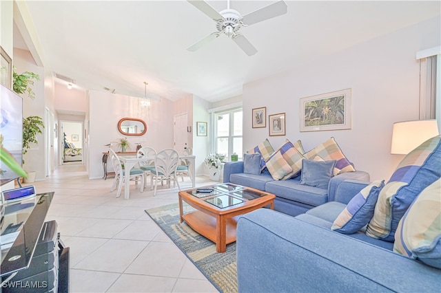 tiled living room featuring ceiling fan