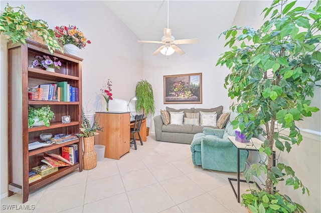 sitting room featuring high vaulted ceiling, ceiling fan, and light tile patterned floors