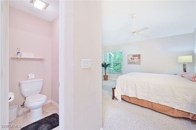 bedroom featuring ceiling fan and light colored carpet