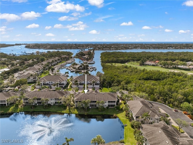 drone / aerial view with a water view