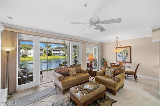 tiled living room with crown molding, a water view, and ceiling fan