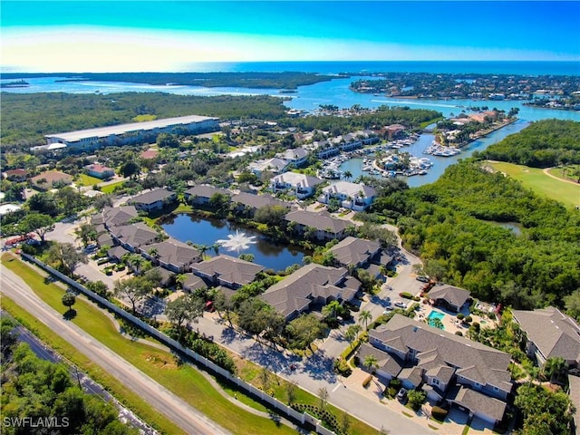 birds eye view of property featuring a water view