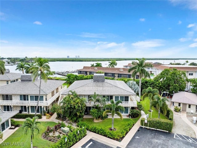 drone / aerial view with a water view