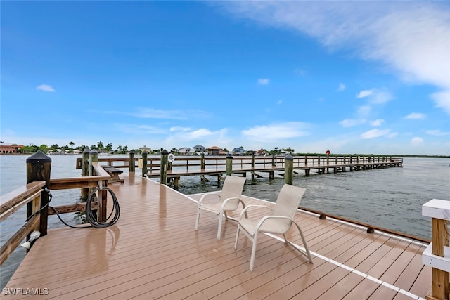 view of dock with a water view