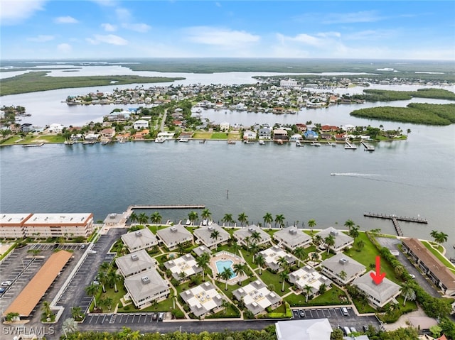 drone / aerial view with a water view