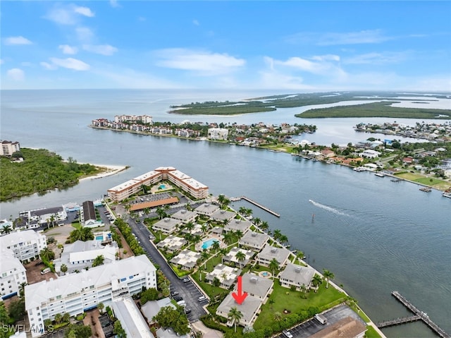 birds eye view of property featuring a water view