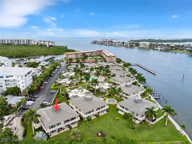 drone / aerial view with a water view