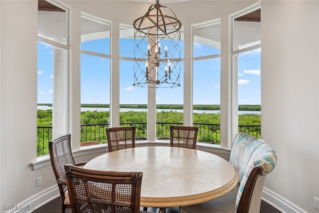 sunroom with a water view