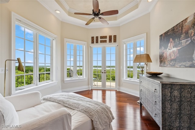 bedroom with dark wood-type flooring, ceiling fan, crown molding, and access to outside