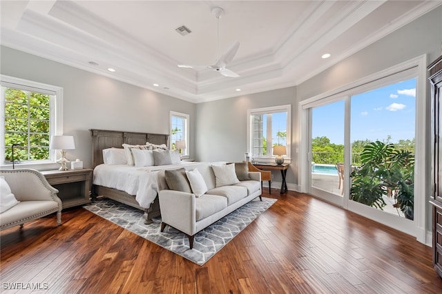 bedroom with dark wood-type flooring, access to outside, and crown molding