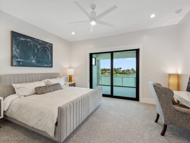 bedroom featuring ceiling fan, light colored carpet, and access to exterior