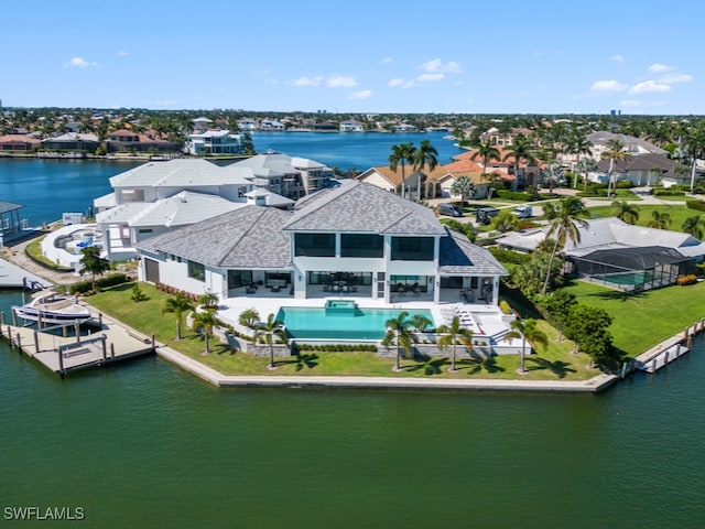 drone / aerial view featuring a water view