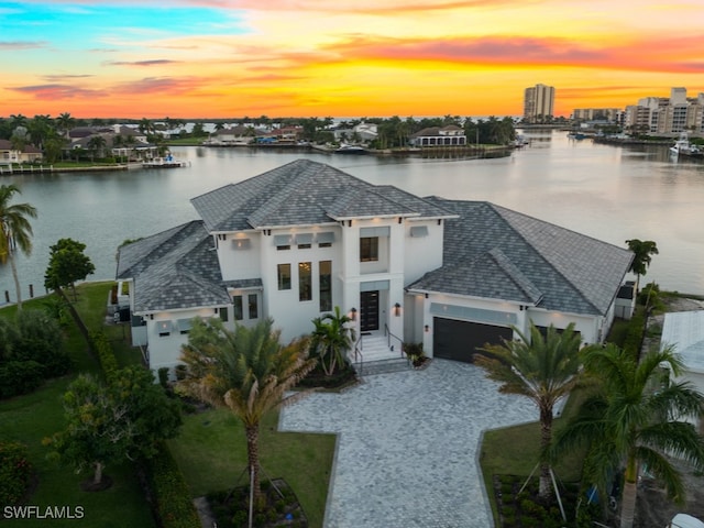 view of front of property featuring a water view