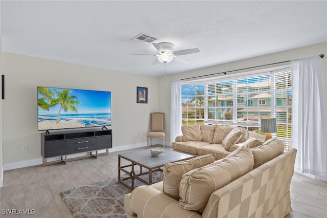 living room featuring ceiling fan