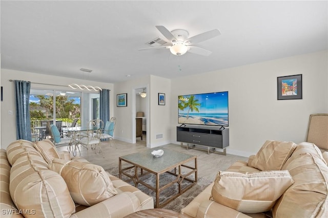 living room featuring ceiling fan