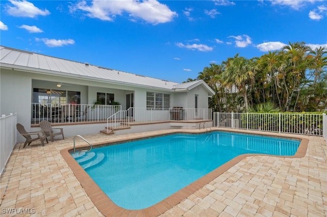 view of pool featuring a patio area