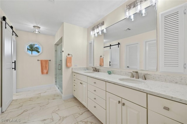 bathroom with vanity and an enclosed shower