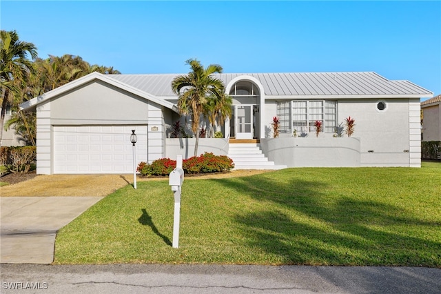 ranch-style house with a garage and a front lawn