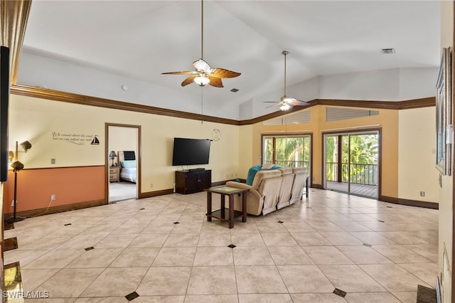10610 Habitat Trl, Bokeelia, FL 33922 - living area featuring ceiling fan, vaulted ceiling, baseboards, and light tile patterned floors