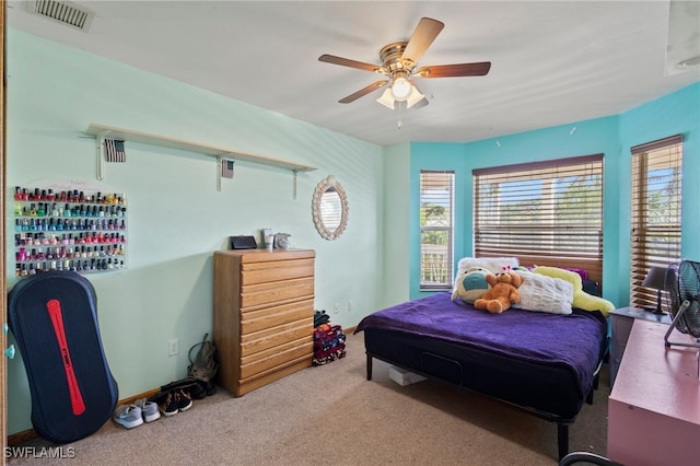 10610 Habitat Trl, Bokeelia, FL 33922 - carpeted bedroom with a ceiling fan