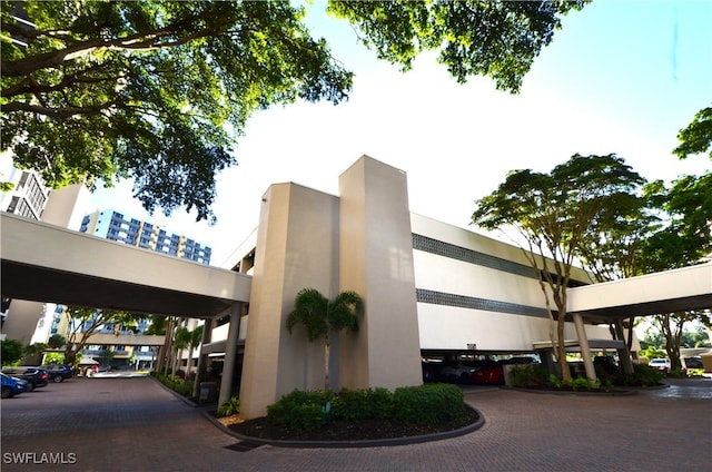 view of building exterior featuring a carport