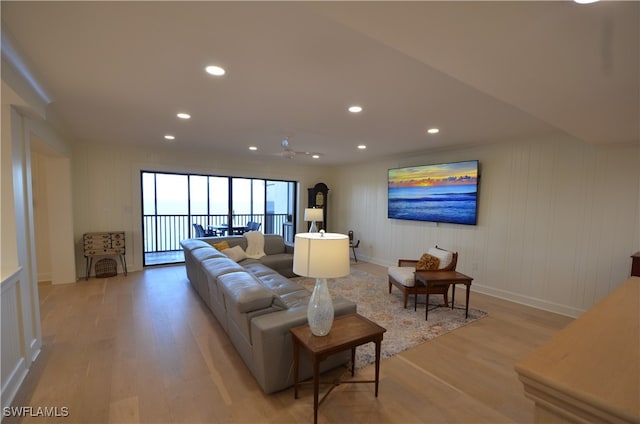 living room with light hardwood / wood-style flooring