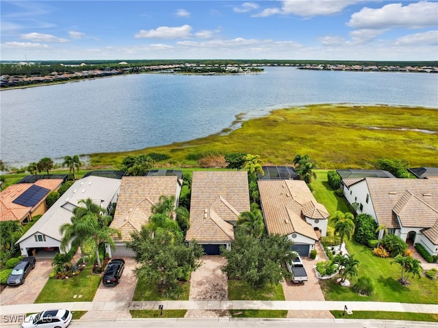 aerial view featuring a water view