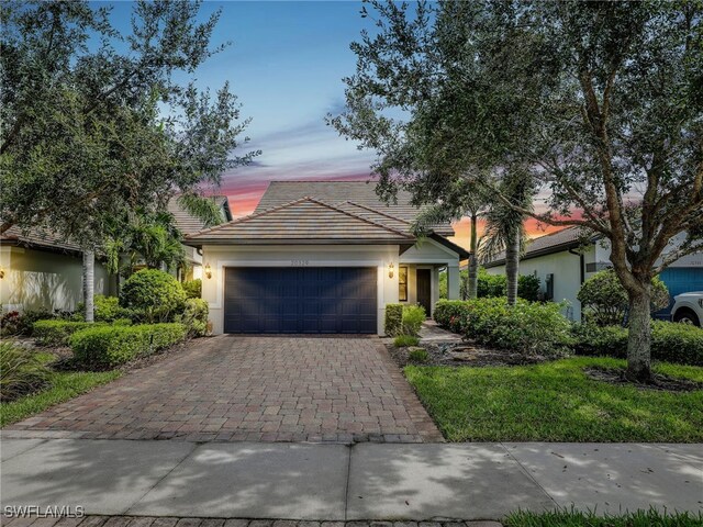 view of front of property featuring a garage